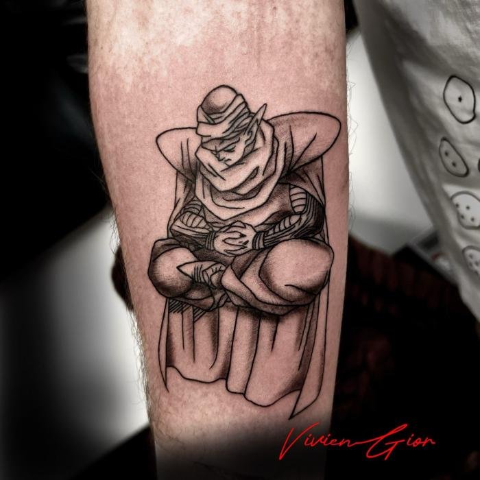  tattoo of anime character from anime dragon ball z on hand sitting sad