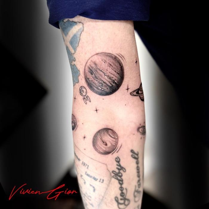  realistic Tattoo realism planet in space on hand 